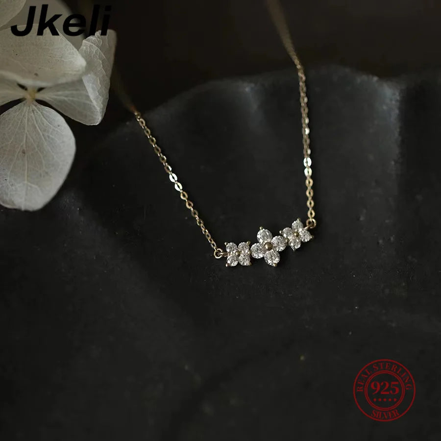 Jkeli 925 Sterling Silver Romantic Three Four Petals Flower Clavicle Necklace for Women Exquisite Charms Party Wedding Jewelry